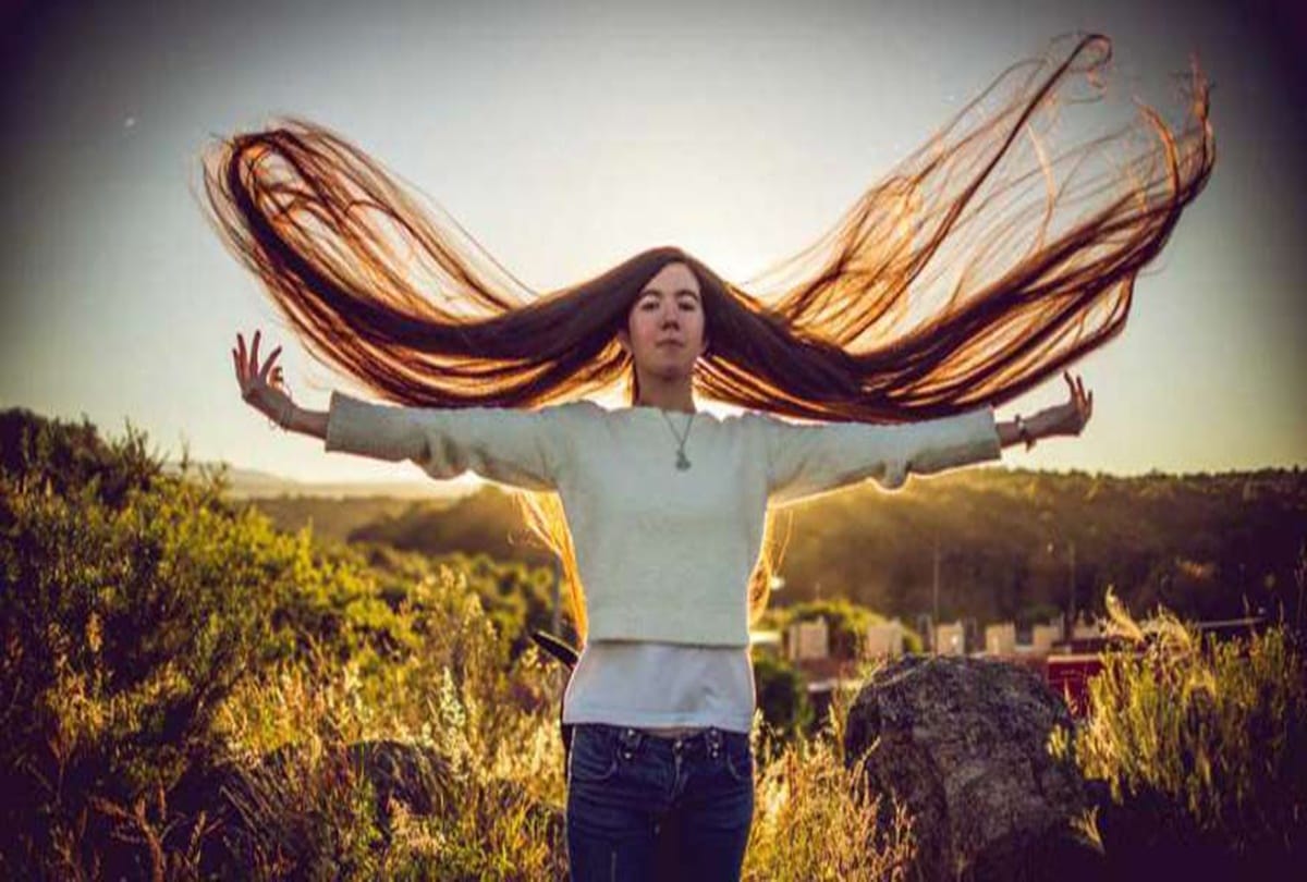 This girl is winning the world by four feet eleven inches long hair