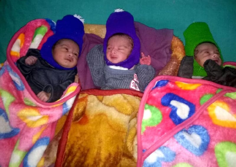 woman give birth three baby