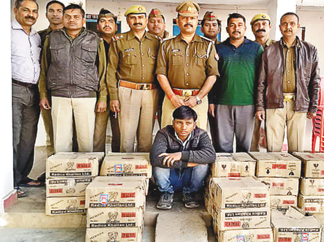 22 bags of liquor recovered from the house, one arrested