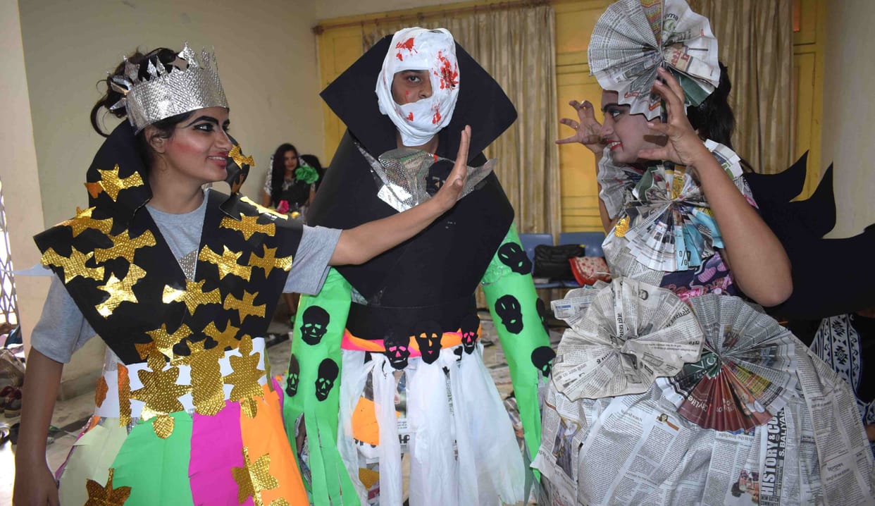 Clothes design by newspaper in kashi yatra fest