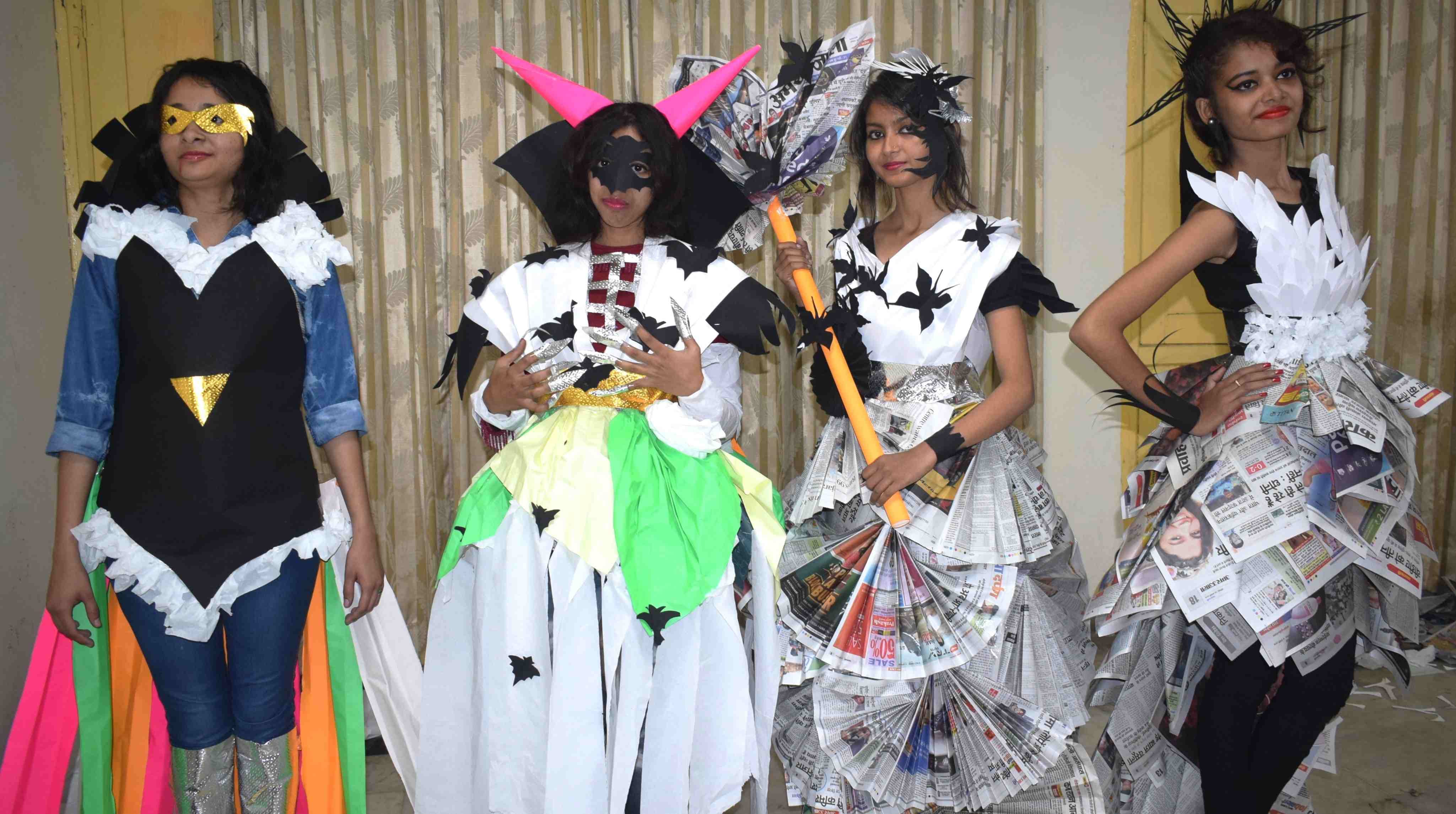Clothes design by newspaper in kashi yatra fest