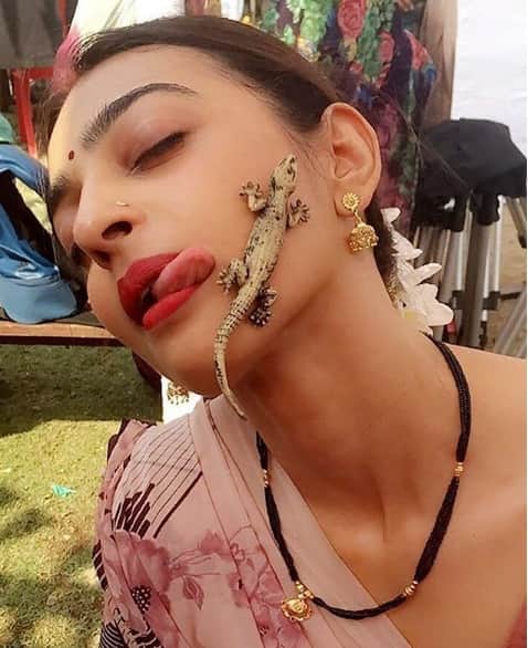 Padman actress Radhika Apte being playful with a lizard