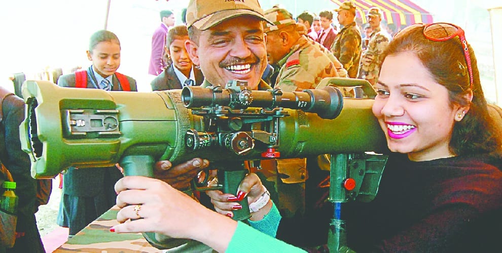 People on patriotic songs, everybody watching the army arms thrilled