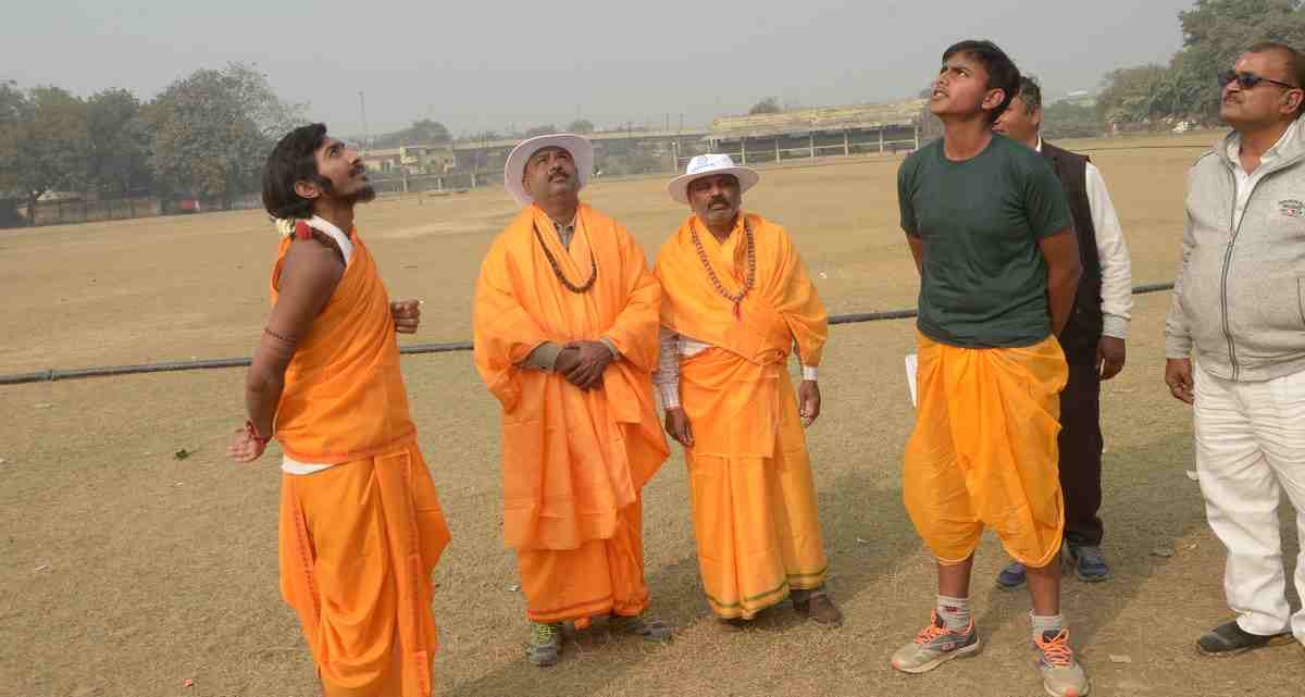 Student playing cricket match in dhoti kurta in varanasi