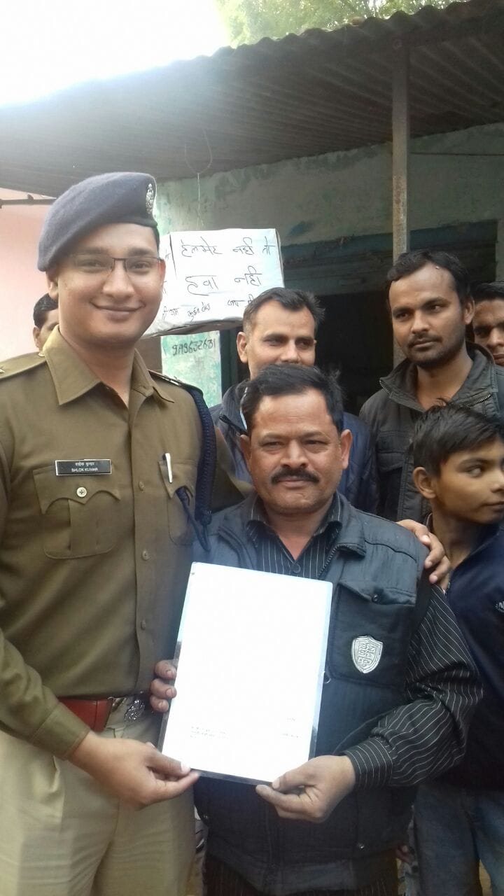 shopkeeper associated with agra police helmet campaign