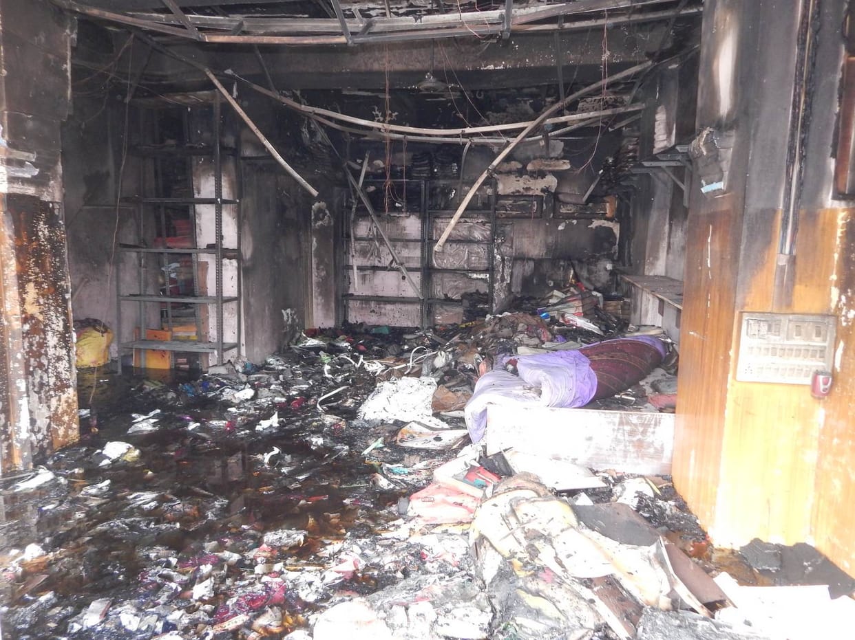 Lack of millions of fire in clothes shop
