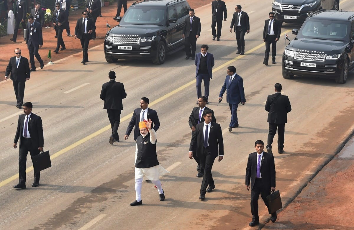Prime mInister Narendra Modi walk on Rajpath to greet people after Republic Day Parade