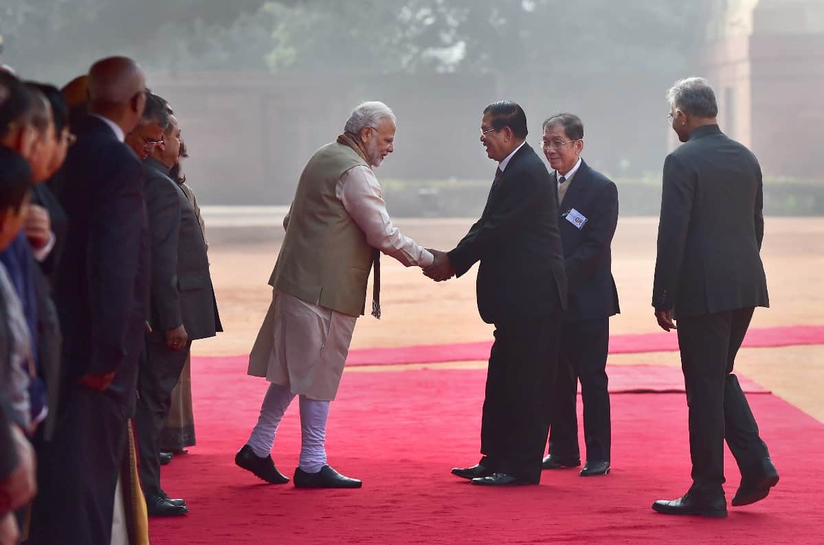 PM Narendra Modi greets his Cambodian counterpart Hun Sen during a ceremonial reception