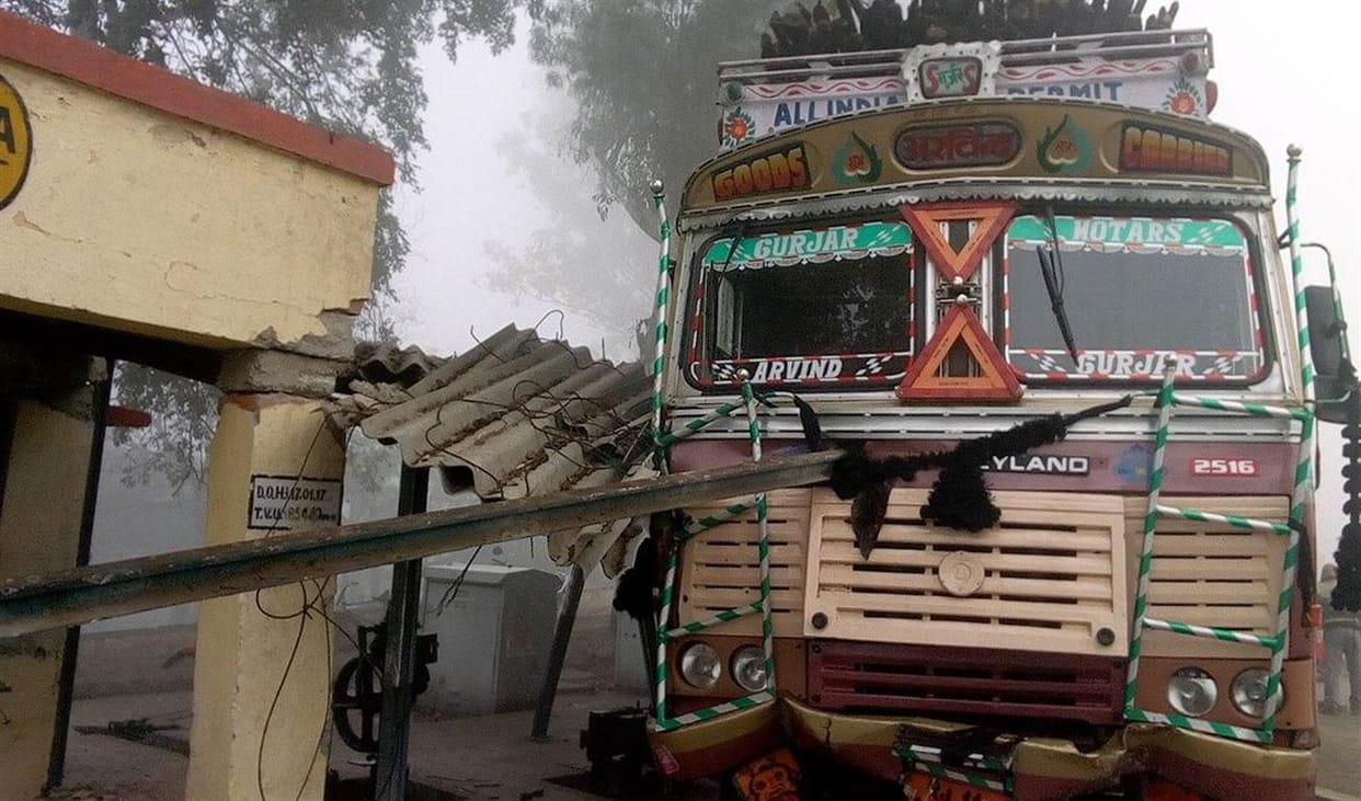 Truck to break into fencing dense fog in railway checkpoint