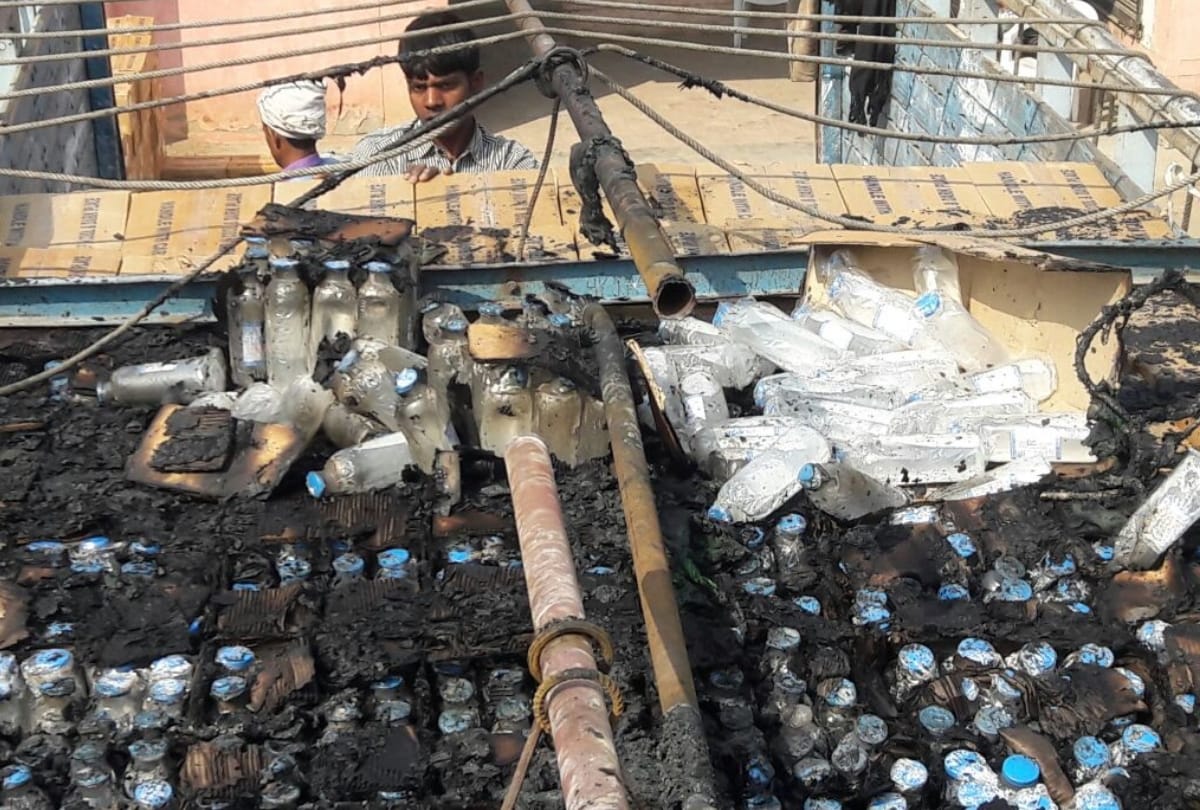 high tension line touched the truck loaded with  glucose bottle, caught fire