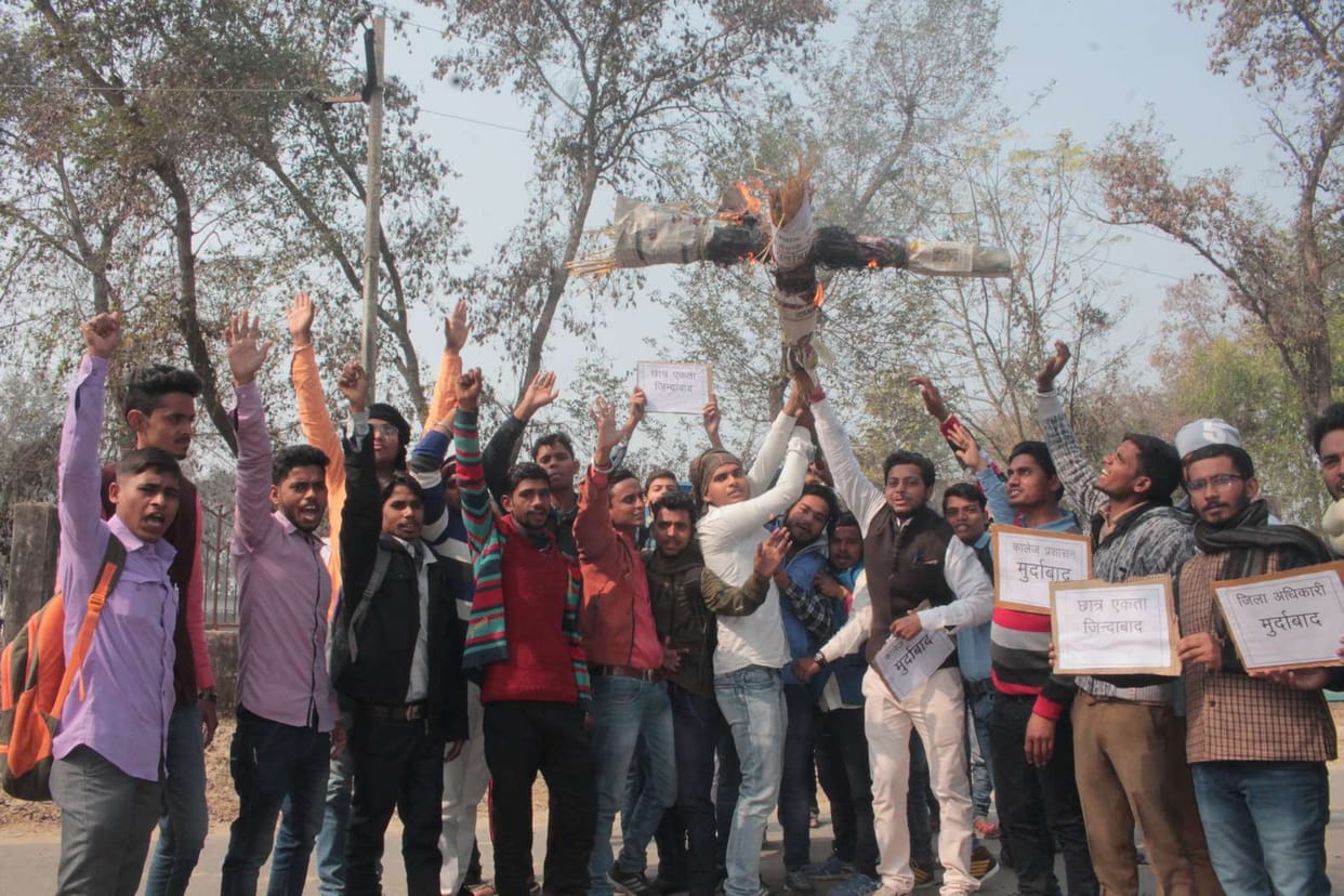 Students blast the effigy of Vice Chancellor