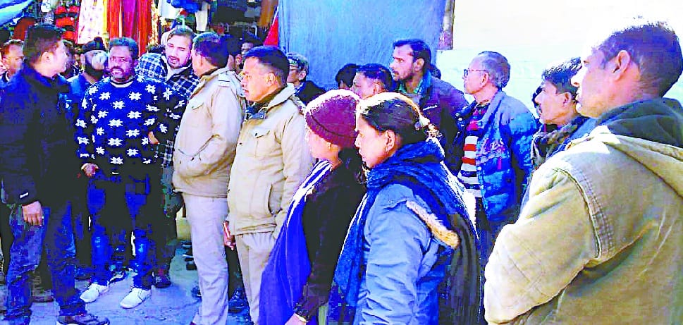 Traders removed women's turban