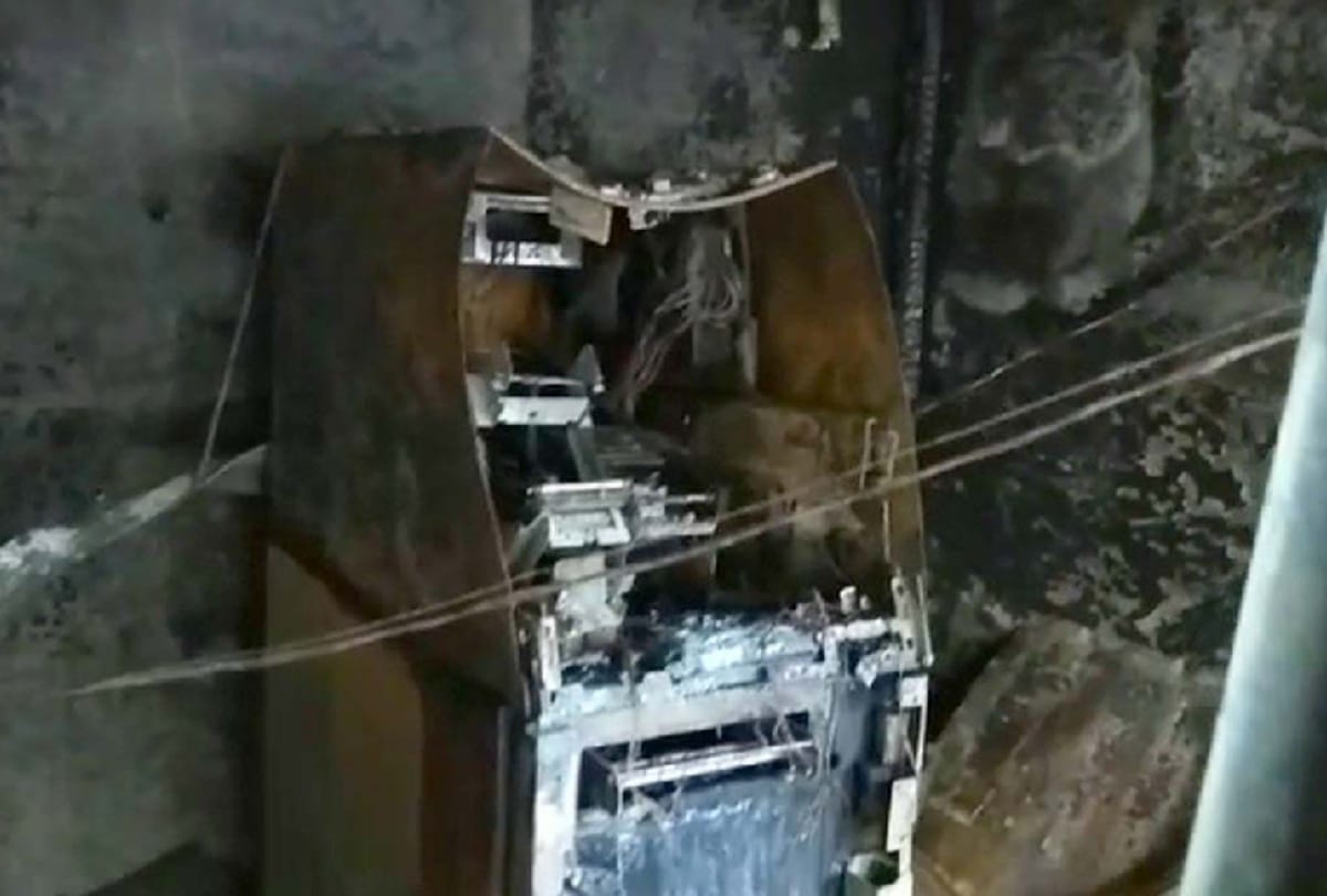 two atm booths caught fire, cash burnt in one atm