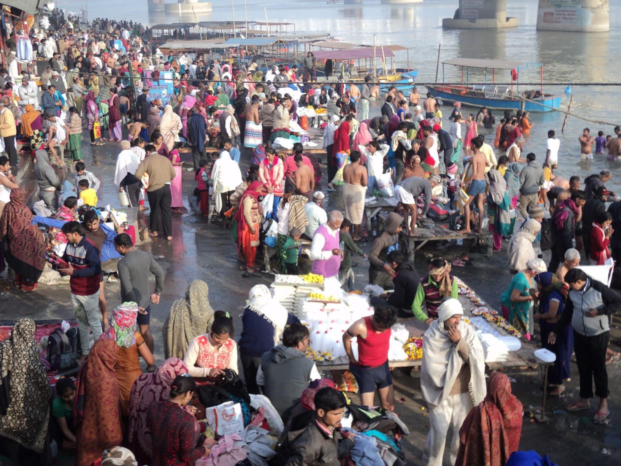 thousands of pilgrims drip in ganga at brijghat