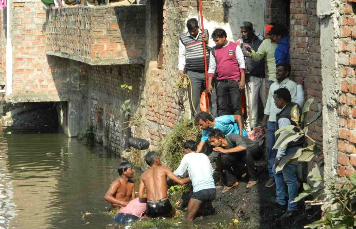 Two brothers immersed in pond in chandauli