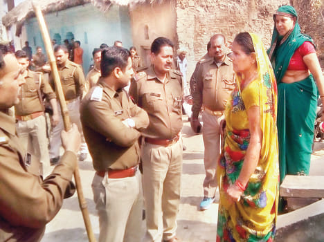 Pradhan entered the house and beaten, firing