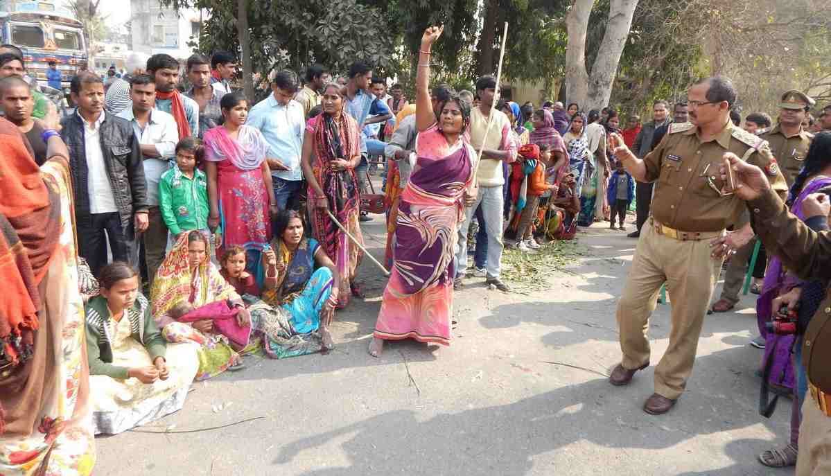 prisoner family members protest out side ballia jail