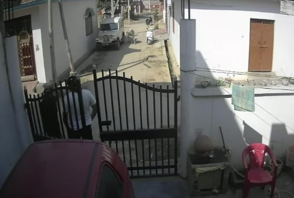 A woman fired on attackers who were beating her husband.