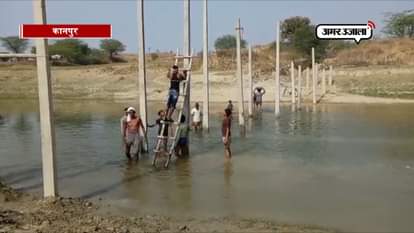 Villagers making the bridge over river without government assistance