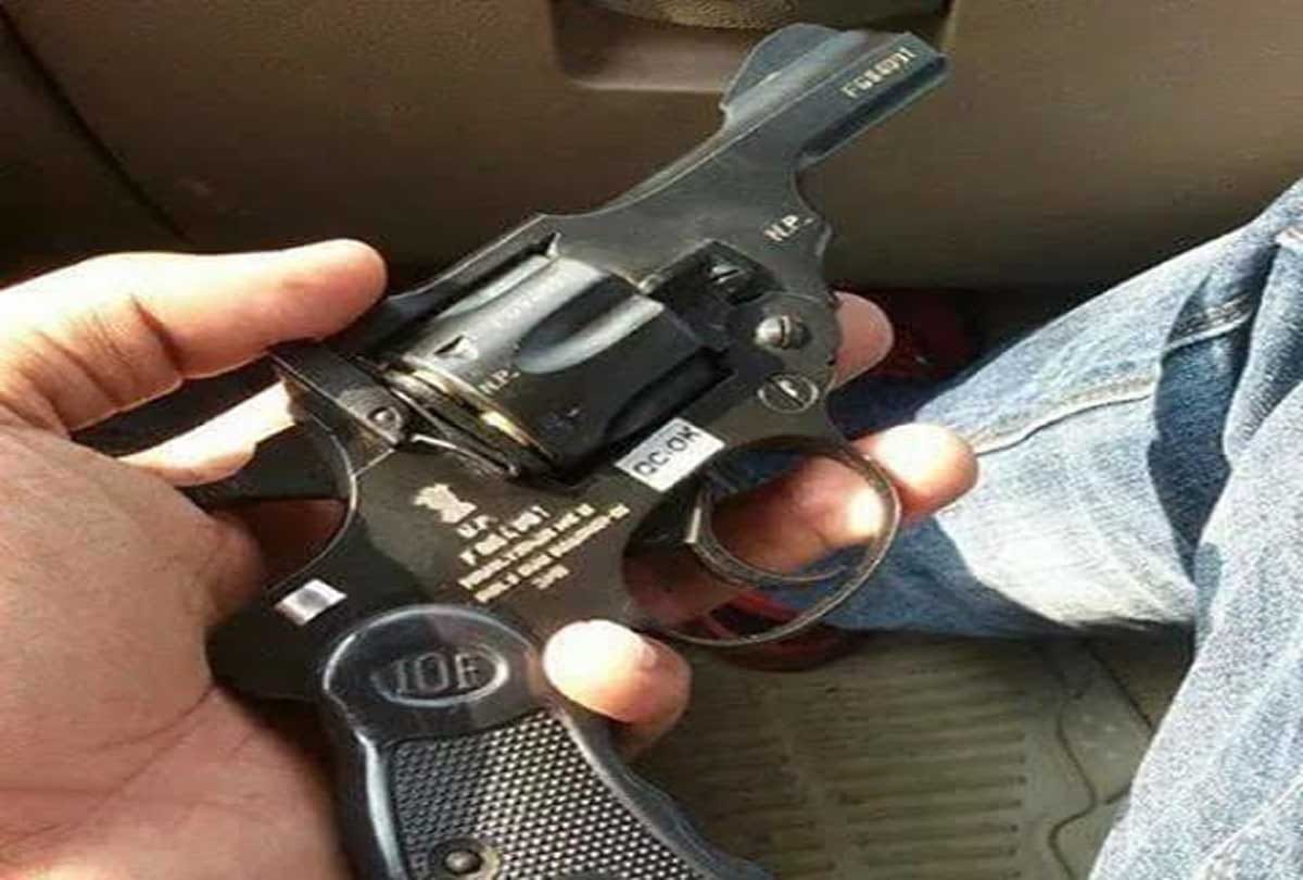 student post photo with gun