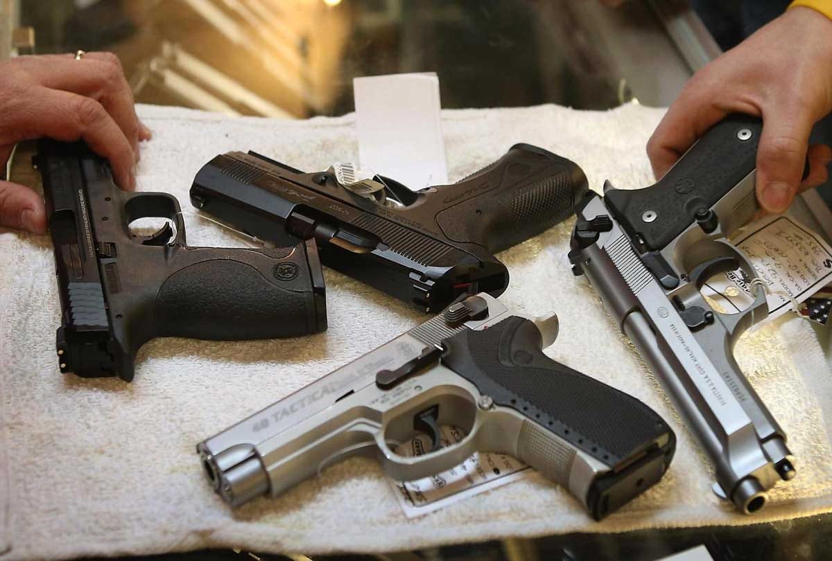 student post photo with gun