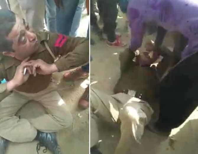 drunk police man beaten up on road in hisar