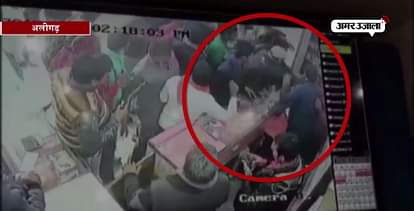 Watch Hindu Jagran Manch workers thrash mobile shop owner in Aligarh