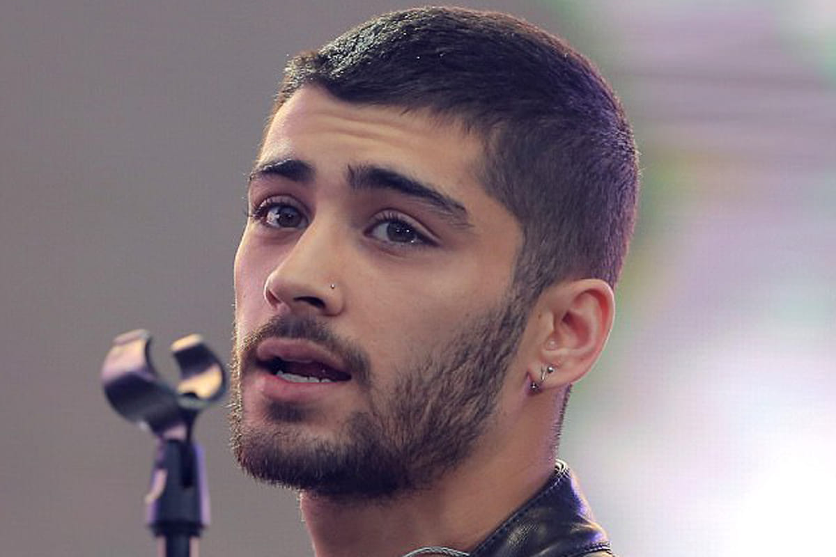 Pop star Zayn Malik says he was not the big fan of Shahrukh until he met king khan