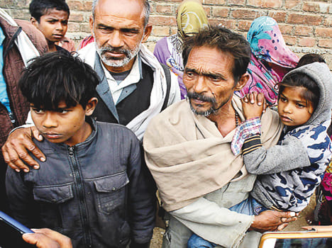Arrested for murder of couple and two sons