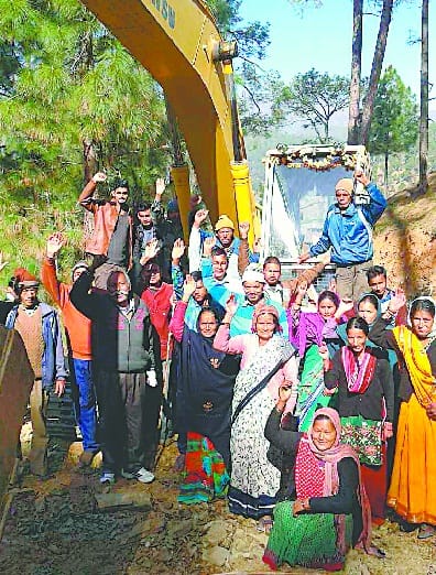 JCB engaged in the construction of Khatigaon-Nagroli road
