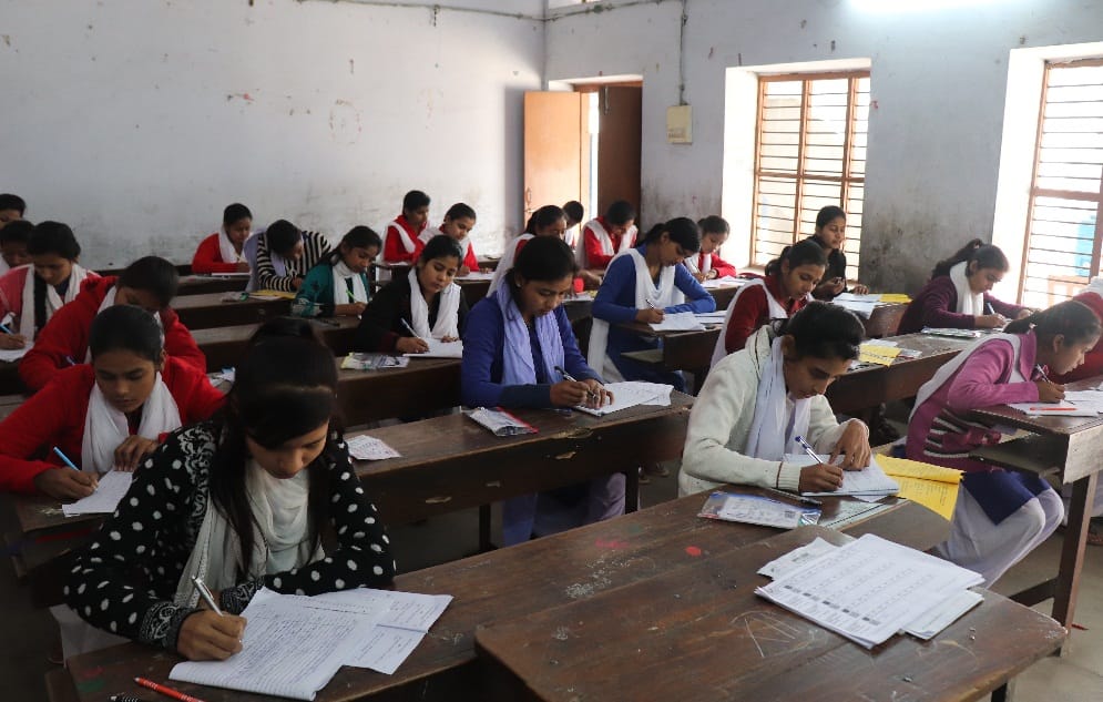 up board : Police caught a man in suspence of copying in exam