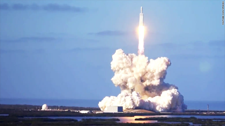 Amazing photos of space x  falcon heavy, sports car in Space 