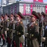 north Korea leader kim jong un shows millitary power before winter olympics why
