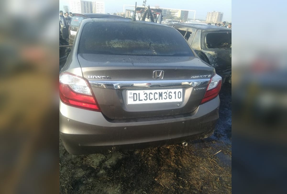 auto expo 2018: car standing in parking catches fire, some others cars also burnt