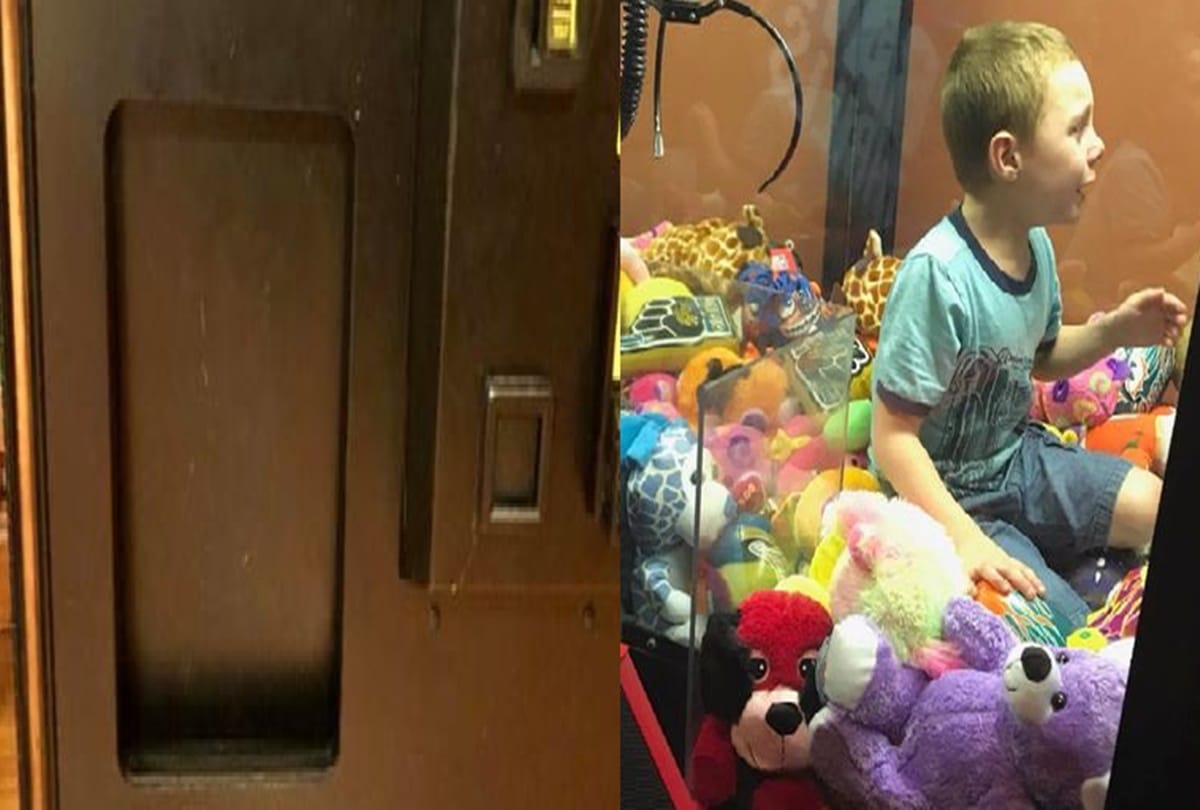 boy climbs into toy claw machine and strucked into it firefighter save him