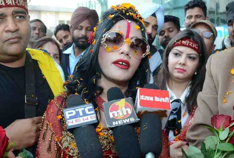 Self Styled God Woman Radhe Maa in Red Colour Gown