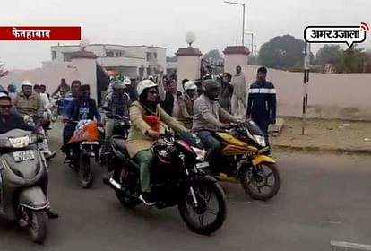 sunita duggal inviting people for amit shah hunkar rally through her bike rally