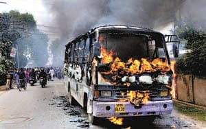 First rained brick and then set fire in the city bus