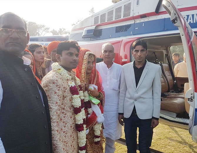 unique marriage, village boy brought his bride via helicopter