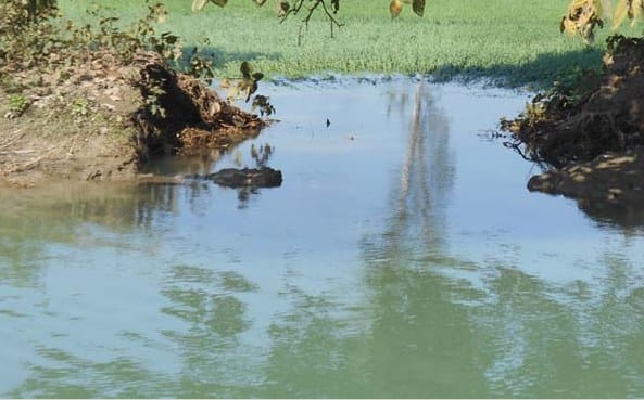 Land goes under water as miner blasts