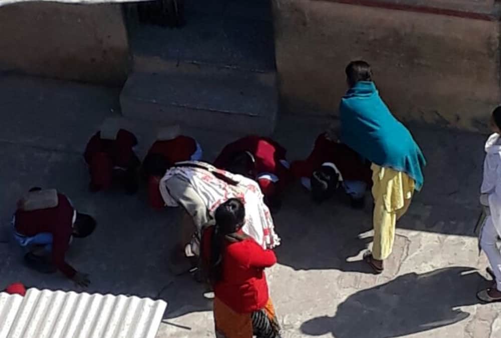 viral pictures of punishment of students.