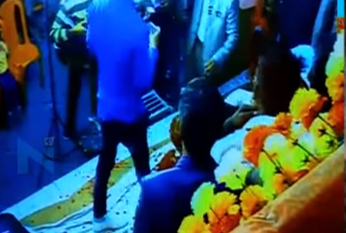 fight in wedding taking selfie with bride