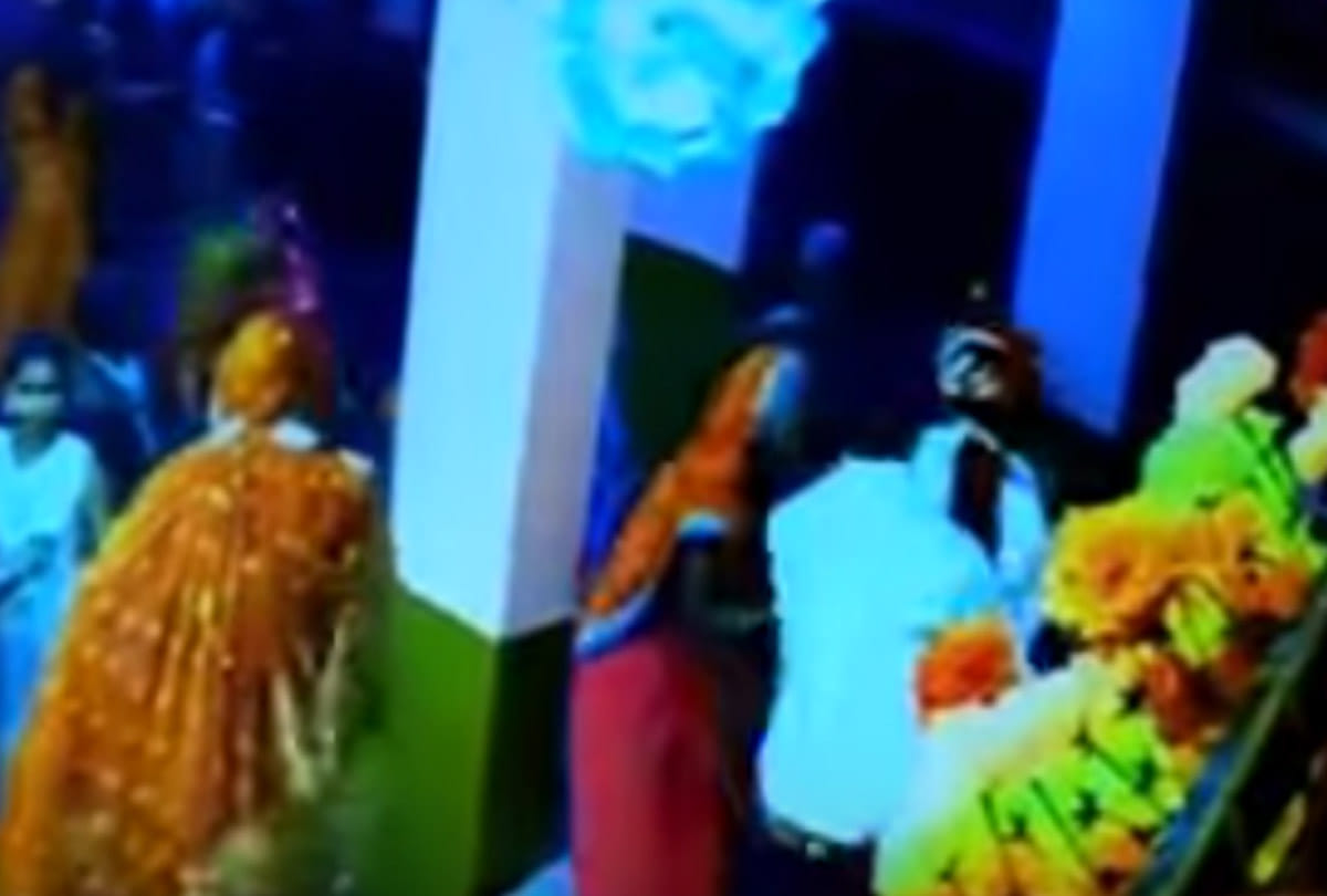 fight in wedding taking selfie with bride