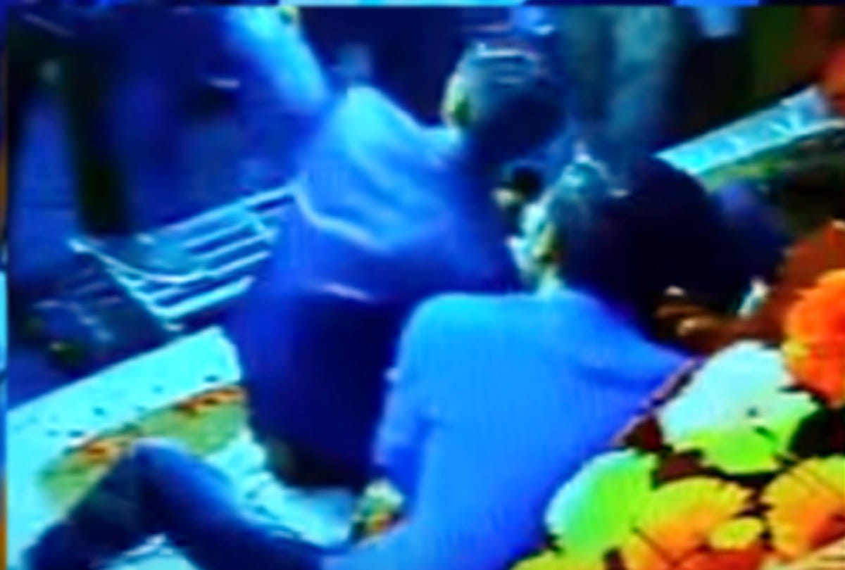 fight in wedding taking selfie with bride