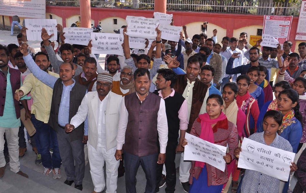 protest against student murder in allahabad