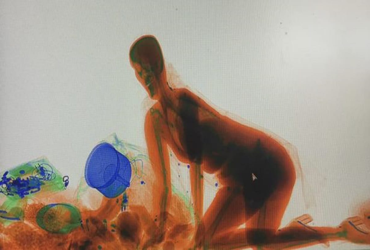 Watch How Women Ride In The X Ray Security Scanner To Safeguard Her Luggage In China