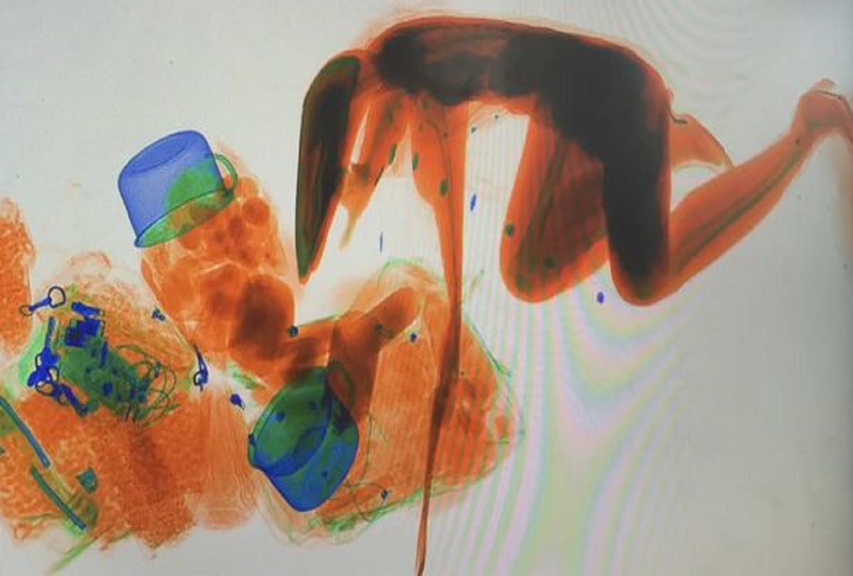 Watch How Women Ride In The X Ray Security Scanner To Safeguard Her Luggage In China