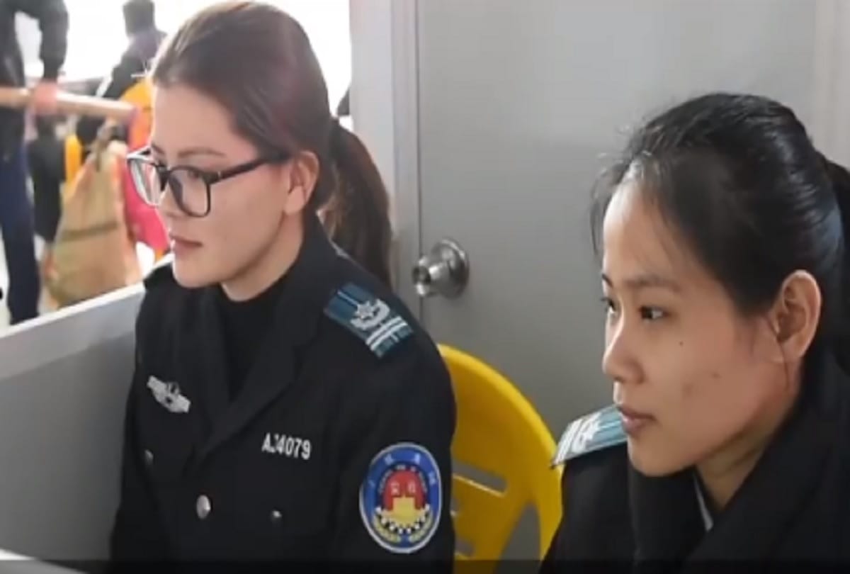 Watch How Women Ride In The X Ray Security Scanner To Safeguard Her Luggage In China