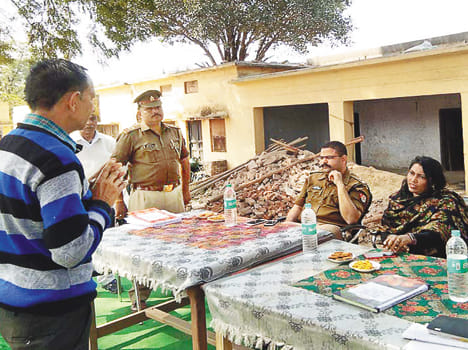 Complaints of occupation of land in front of DM and SP