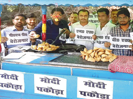 Students protest by selling pakoda